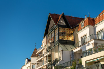 Closeup of building facades in morning sunshine near Cascais marina