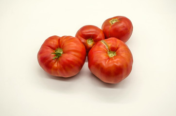  Very large and delicious red tomatoes grown in Armenia on a white background