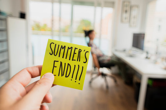 man at office and text summers end