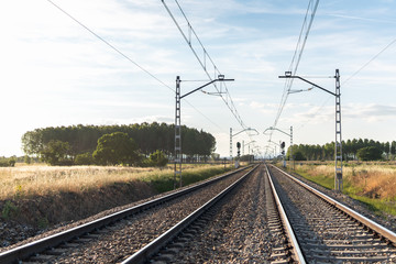 Fototapeta na wymiar The tracks of a train on a sunny day in León (Spain)