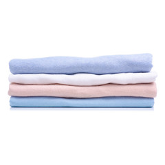 Fototapeta na wymiar Stack folded shirt clothing, pastel color on white background isolation