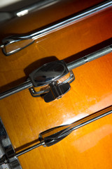 percusions drums with drumsticks on it close-up