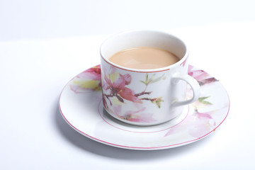 traditional English cup of tea. English cup of tea served someone. isolated on a white background.