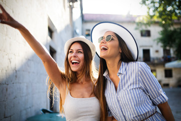 Girl friends travelling summer vacation exploring to discover carefree lifestyle