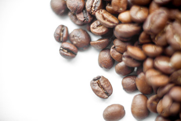 Roasted coffee beans heap background