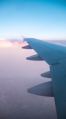 Fototapeta premium Plane wing air clouds. Transport, transportation. Holidays.