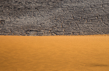 Abstract background of red sand and dried mud