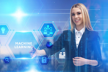 The concept of business, technology, the Internet and the network. A young entrepreneur working on a virtual screen of the future and sees the inscription: Machine learning