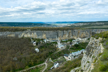 Fototapeta na wymiar Aerial drone shot of Bakhchisaray Cave Monastery, also known as Assumption Monastery of the Caves