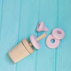 ice cream pink pyramid on a blue wooden background