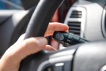 close-up of a turn signal knob in a car © Sergey