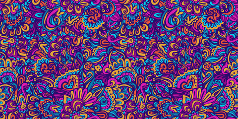 Colorful doodle decorative ornamental seamless pattern. Funky festive cartoon organic shapes surface design