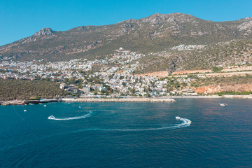 Fototapeta premium Beautiful scenery from sea to the land. Green hills and mountains shot with drone