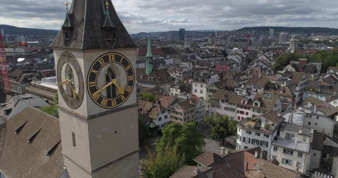 Z&uuml;rich Saint Peter church back traveling - Aerial 4K