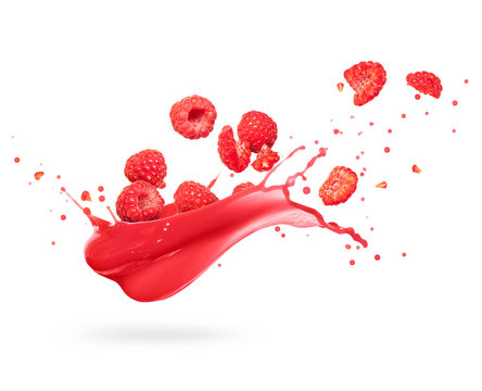 Raspberries with splashes of fresh juice, isolated on white background