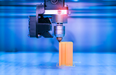 3D printer or additive manufacturing and robotic automation technology.