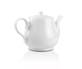 White kettle on white background. Side view of ceramic teapot .