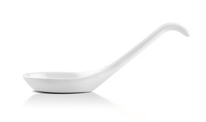 Ceramic white spoon isolated on white background. Side view