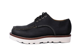 Man fashion close-up a pair of black shoe isolated on a white background.