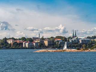 Fototapeta na wymiar Beautiful skyline of Helsinki city center from Suomenlinna islands