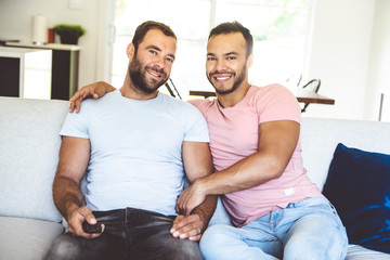 Obraz premium Portrait of a Cute Male gay homosexual Couple at Home