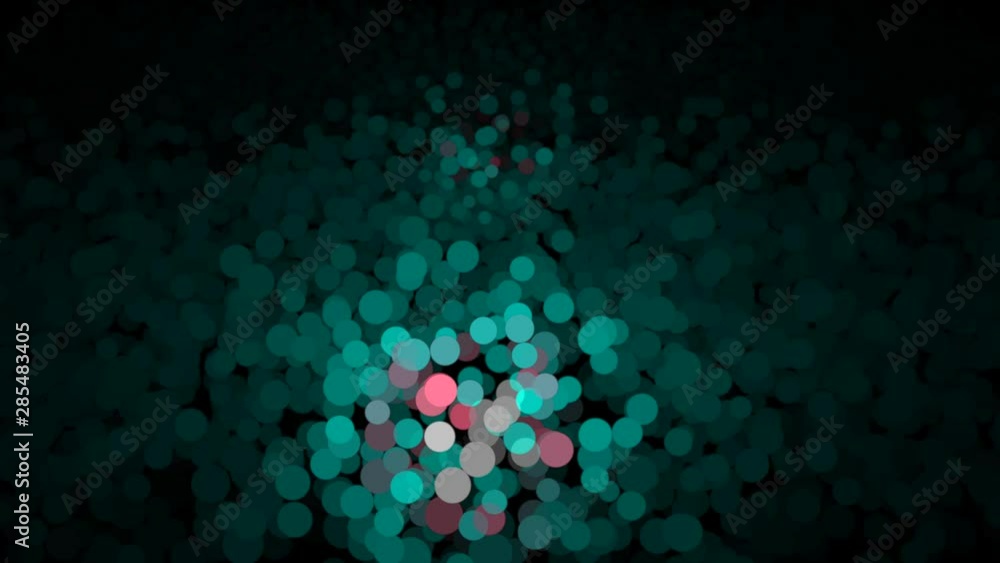 Poster colorful abstraction of shimmering multicolored particles appearing and fading on the black backgrou