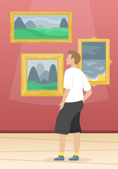 A man looks the paintings of famous artists. Fine arts museum. Classical art.