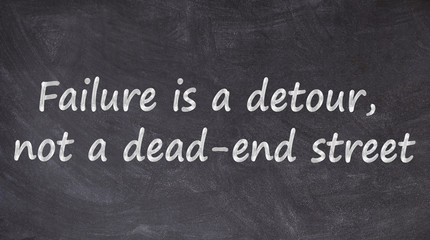 Failure is a detour, not a dead-end street written on blackboard