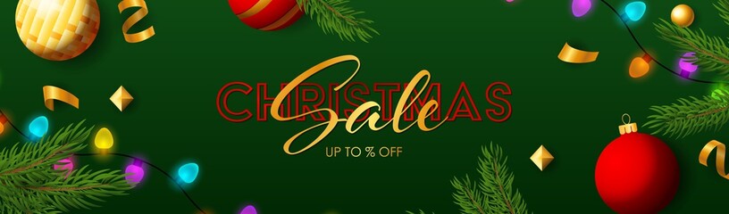 Christmas Sale lettering with sparkling colorful light bulbs, Christmas toys and fir branch on green background. Lettering can be used for posters, leaflets, announcements