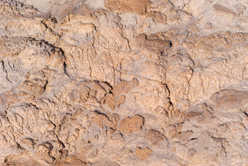 background - mud in a dried riverbed