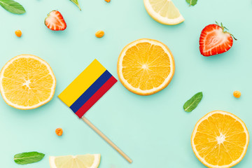 Colombia Paper Stick Flag. National summer fruits concept, local food market. Vegetarian theme.
