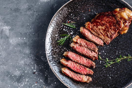 New York Strip Steak Medium Rare With Rosemary Top View 