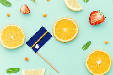 Nauru Paper Stick Flag. National summer fruits concept, local food market. Vegetarian theme.