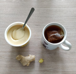 a cup of tea with ginger and honey for the flu