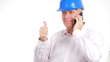 Happy Engineer Talk to Cellphone Smiling and Thumbs Up
