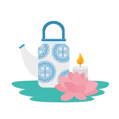 traditional chinese teapot with lotus flower and candle