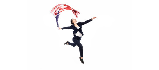Fototapeta na wymiar panoramic shot of businesswoman dancing with usa national flag isolated on white