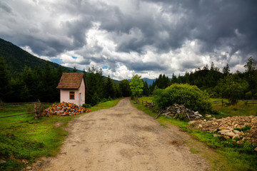 The road in the Carpathian mountains. Bad weather.