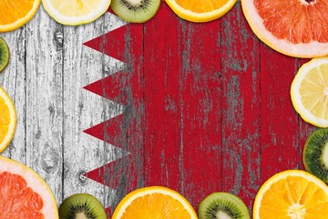 Bahrain food concept. Fresh fruits from traditional gardens. Cooking concept on wooden flag...