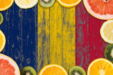 Chad food concept. Fresh fruits from traditional gardens. Cooking concept on wooden flag background.