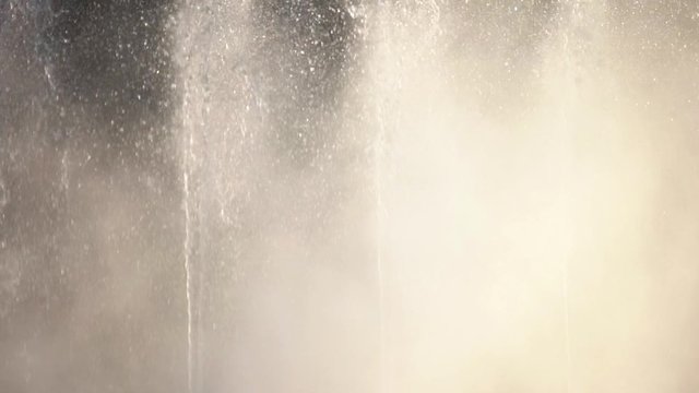 Detail slow motion of artesian fountain in the park