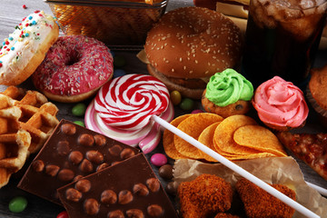 Unhealthy products. food bad for figure, skin, heart and teeth.