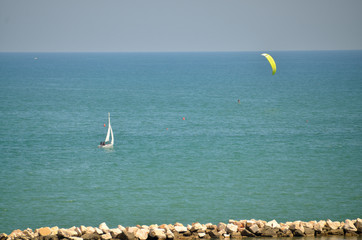 Sailboat sails gently on the sea