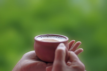 Tea served in a traditional clay cup