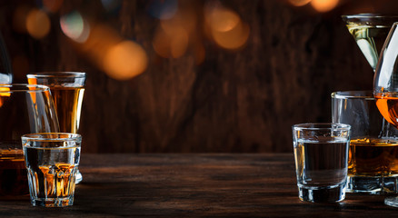 Strong Spirits Set. Hard alcoholic drinks in glasses in assortment: vodka, cognac, tequila, brandy...
