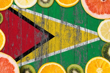 Guyana food concept. Fresh fruits from traditional gardens. Cooking concept on wooden flag...
