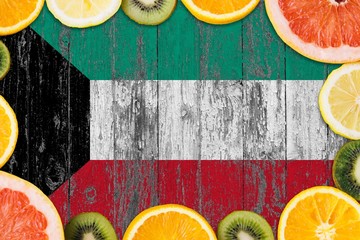 Kuwait food concept. Fresh fruits from traditional gardens. Cooking concept on wooden flag...