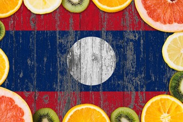 Laos food concept. Fresh fruits from traditional gardens. Cooking concept on wooden flag background.