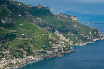 Fototapeta na wymiar Sea, Beach, and Mountains view from the Garden of Villa Rufolo, historic center of Ravello, Amalfi Coast of Italy
