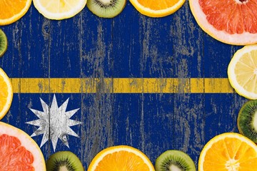 Nauru food concept. Fresh fruits from traditional gardens. Cooking concept on wooden flag...
